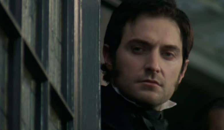 Mr. Thornton stares at Margaret from a distance. Photo: BBC