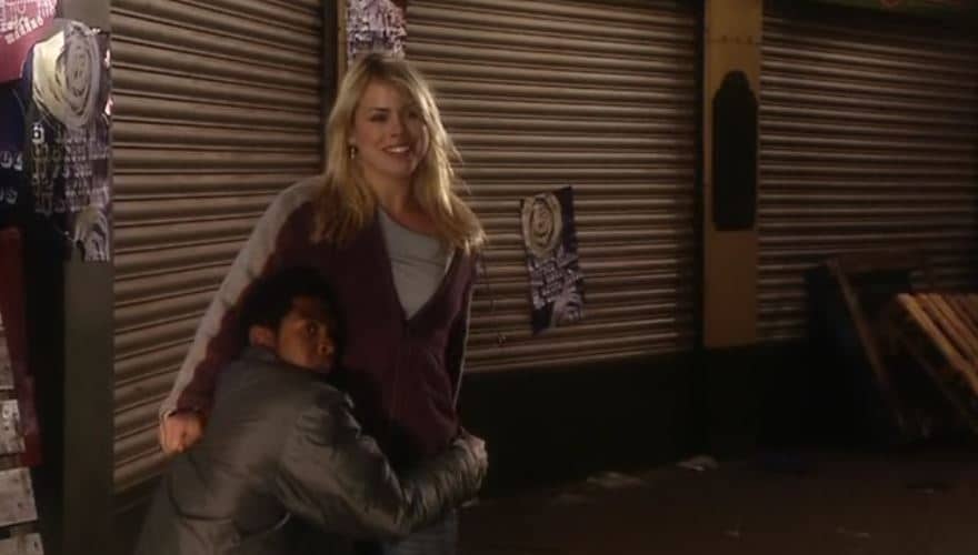 Mickey (Noel Clarke) holds on to Rose. Photo: BBC