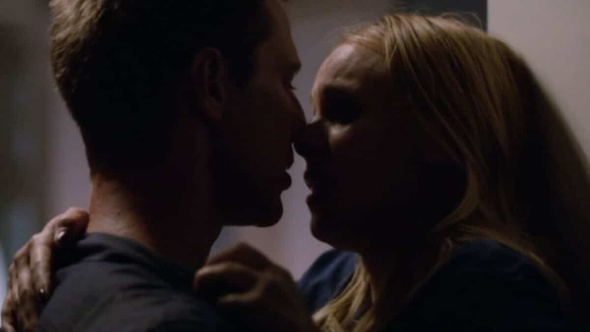 Logan and Veronica look at each other inbetween kissing