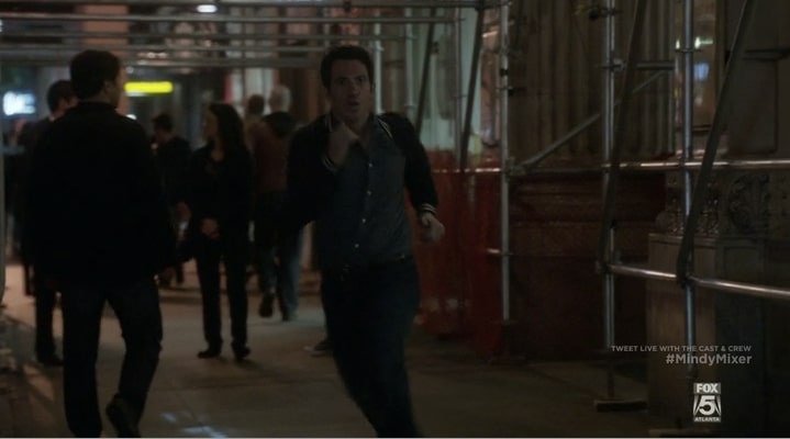 Danny running to meet Mindy on the top of the Empire State Building.