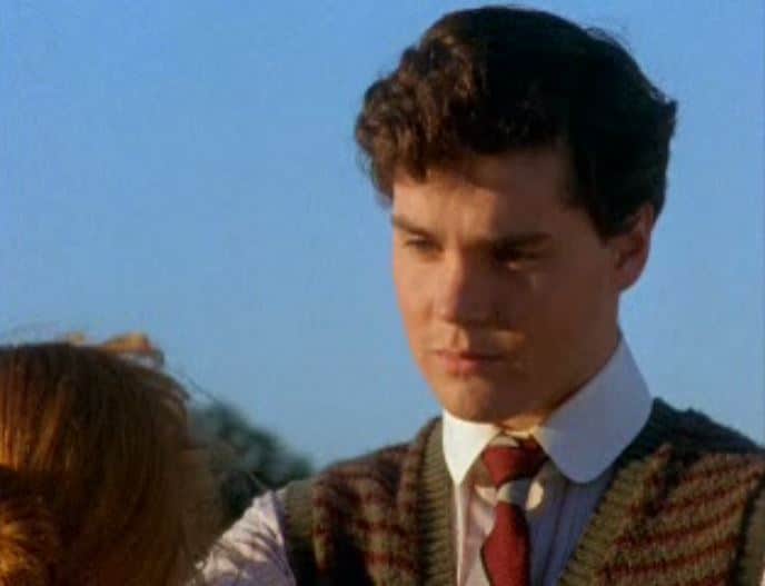 Jonathan Crombie as Gilbert Blythe in Anne of Green Gables. He caresses Anne's cheek.
