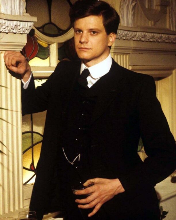 Colin Firth in Lost Empires publicity still. He's wearing period costume and holding a drink.