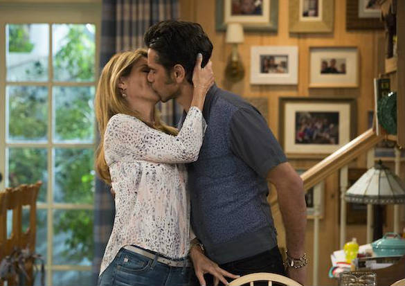 Becky and Jesse share a kiss in Fuller House