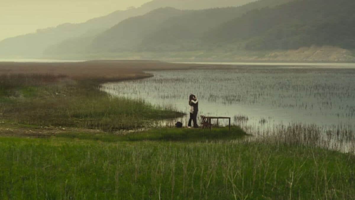 Hug with water behind a couple in Always 2011 movie