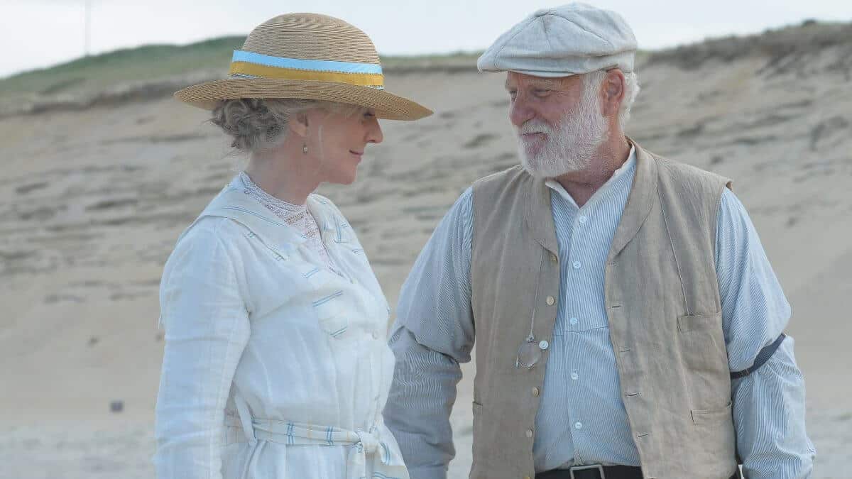 The Lightkeepers 2009 movie still with an older couple talking on the beach.
