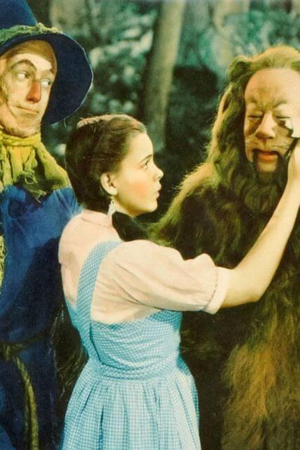 The Wizard of Oz Life Lessons home page photo showing the Scarecrow, Dorothy, and the Cowardly Lion from a lobby card.