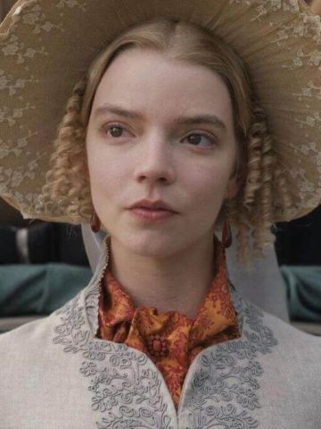 Emma 2020 review featured image of Emma sitting on back of carriage