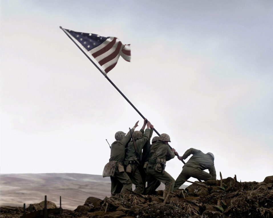 Flags of Our Fathers movie still of soldiers lifting American flag 