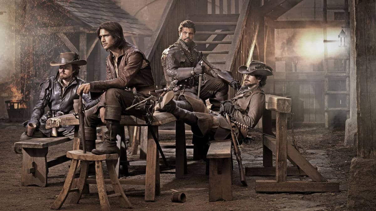 the musketeers 2014 promo image showing four men in period costume
