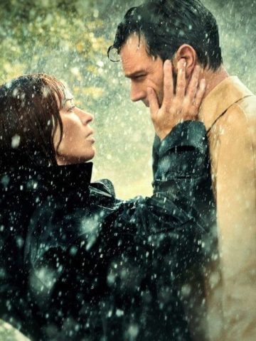 Wild Mountain Thyme publicity still with Emily Blunt and Jamie Dornan in the rain
