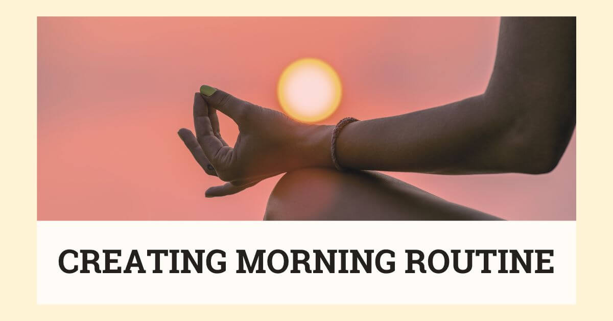 Creating Morning Routine: A Woman meditates with a sunrise.