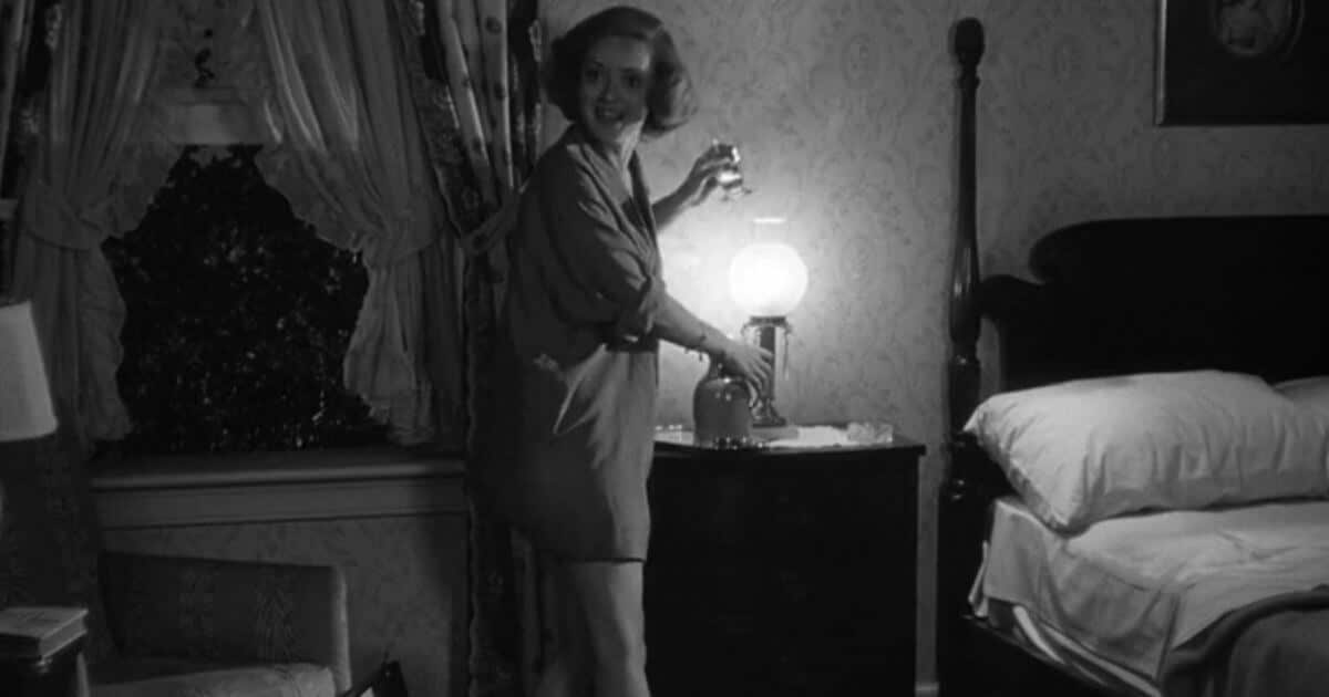Bette Davis in Old Acquaintance wearing pajamas.