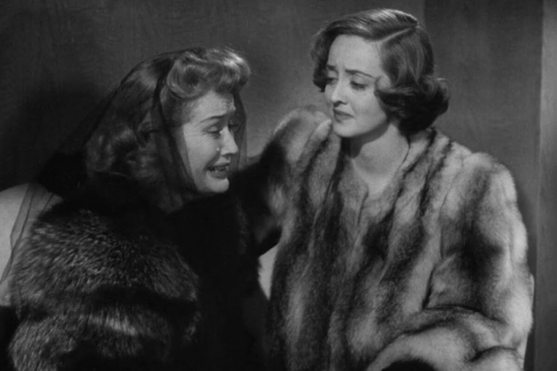 Millie and Kit in Old Acquaintance 1943 film having an intimate friend moment.