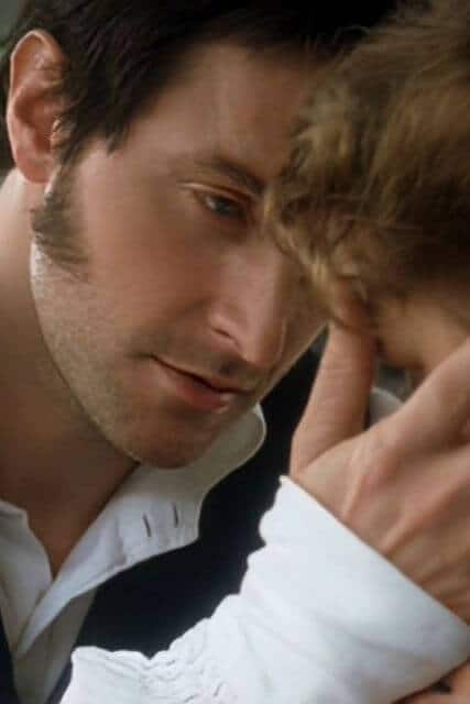 Richard Armitage in North & South - caressing a woman's face.