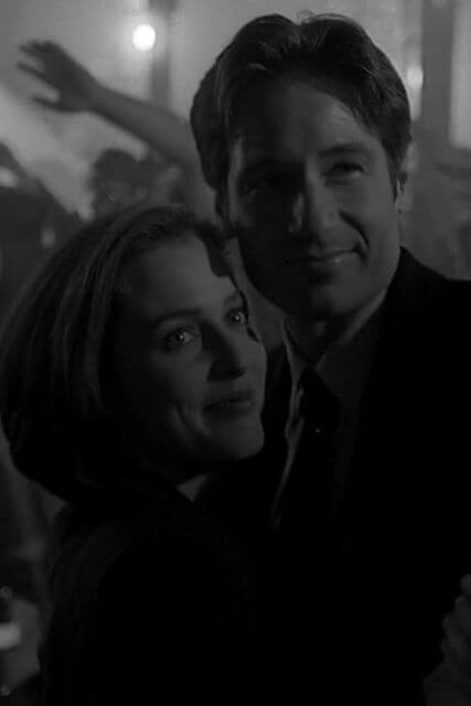 Scully and Mulder dancing.