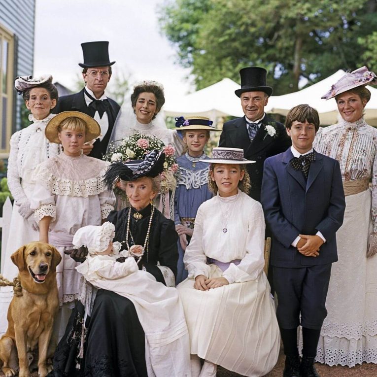 An Edwardian group wedding photo in color. It's from the Jasper and Olivia wedding from Road to Avonlea.